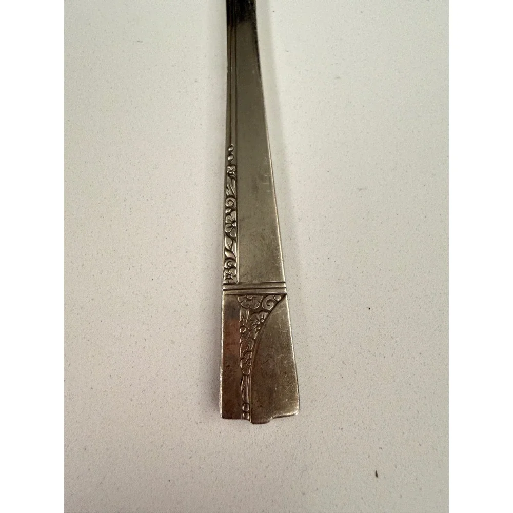 vintage Oneida Nobility silverplate butter knife in the Caprice pattern
